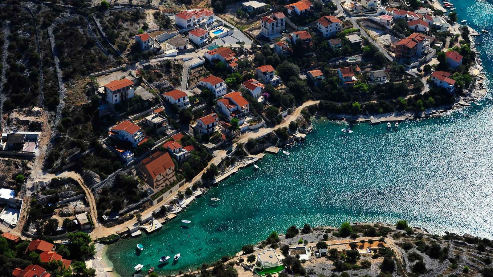 Aerial view of a Sevid bay with the seafront project highlighted